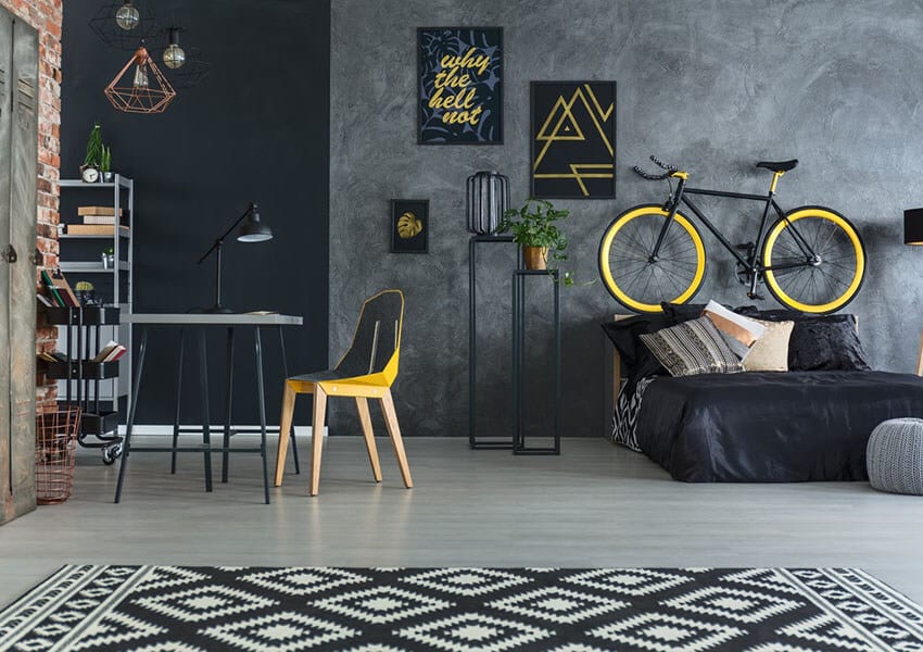 imagem de apartamento jovem e moderno mobiliada com bicicleta na sala 