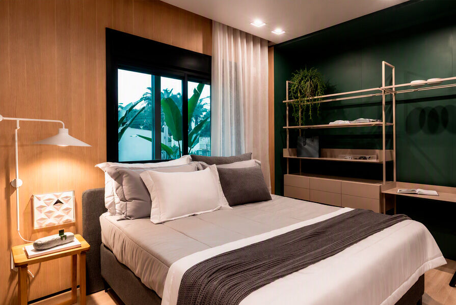 Quarto moderno com cama e decoração minimalista