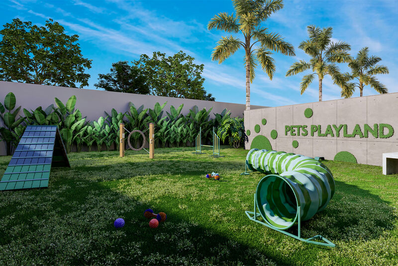 Espaço pet com brinquedos e gramado verde
