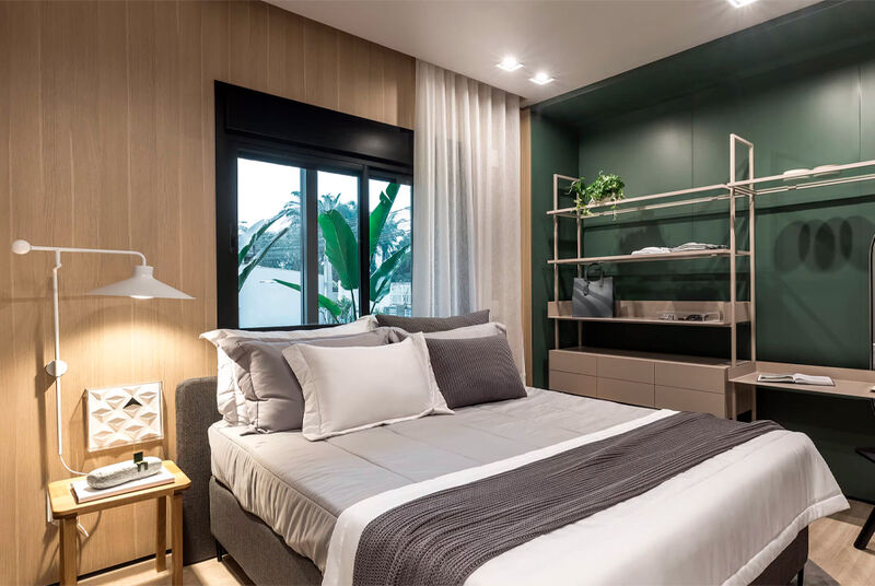 Quarto moderno com cama e decoração minimalista