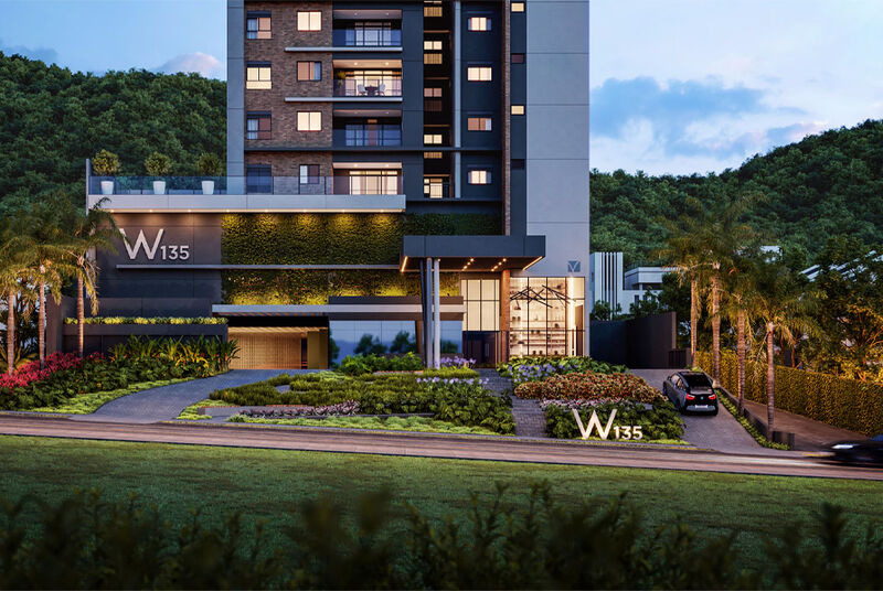 Entrada do edifício W135 com paisagismo exuberante