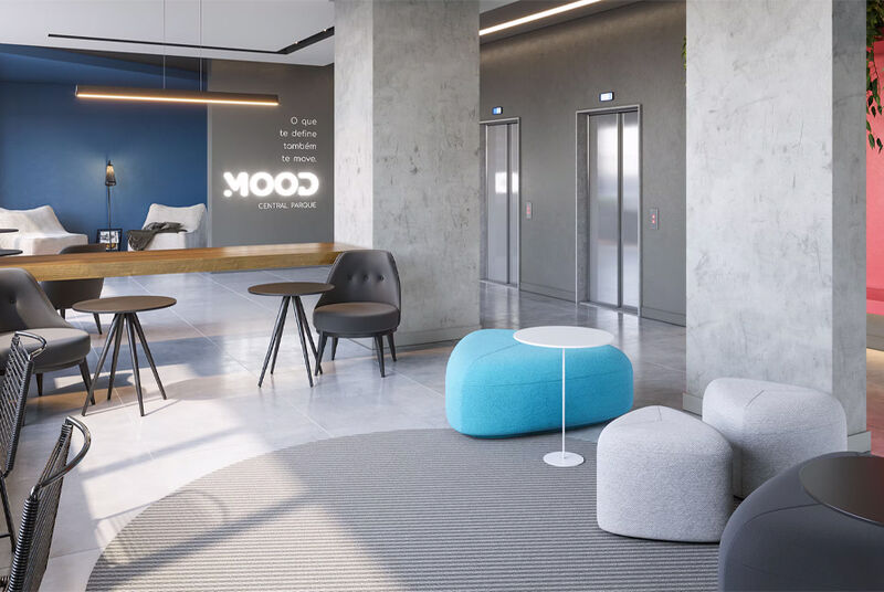 Coworking moderno com poltronas e elevadores