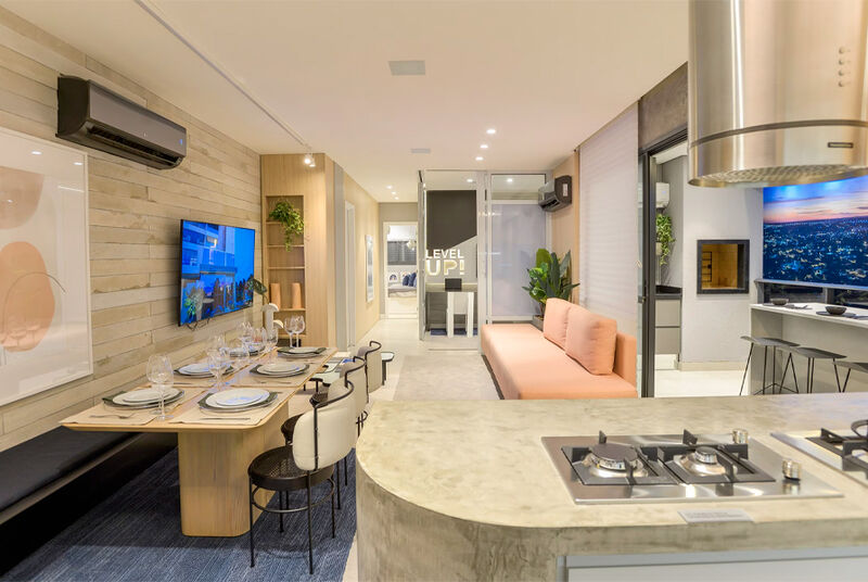Sala de estar moderna com cozinha integrada
