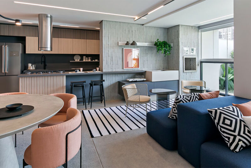 Sala de estar moderna com cozinha integrada e decoração sofisticada