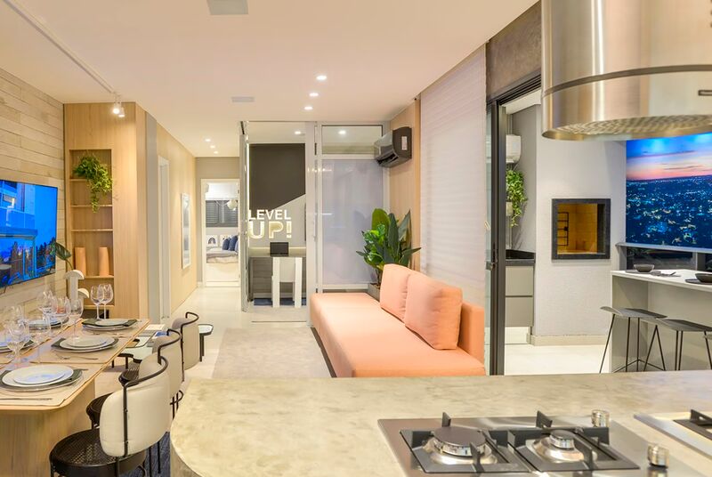 Sala de estar moderna com cozinha integrada